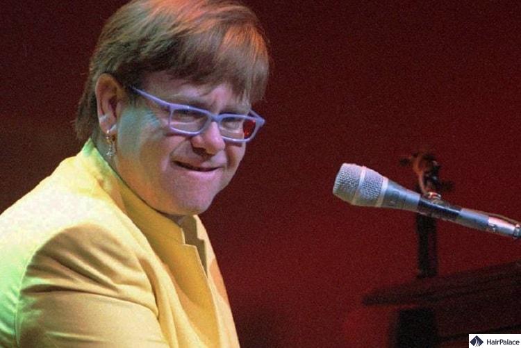 elton-john-peruecke-haare-1997-1